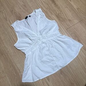 White Sleeveless V-Neck Peplum Top